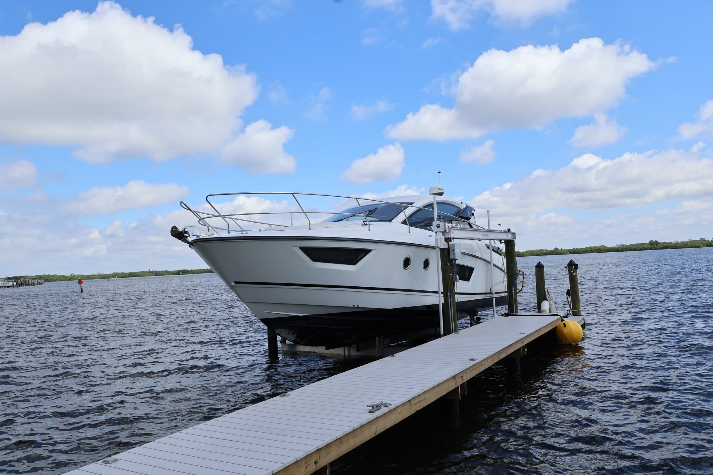 The Gran Turismo 40 on her lift at the end of the dock